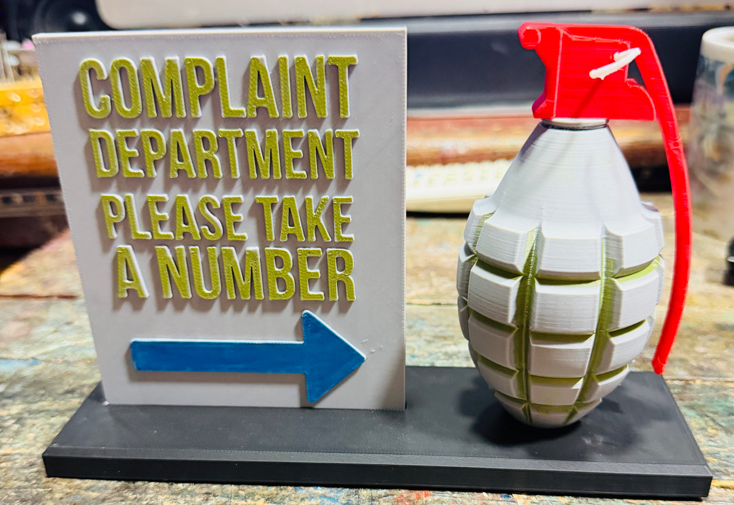 grenade-shaped complaint dispenser