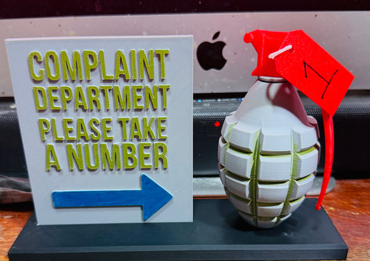 grenade-shaped complaint dispenser